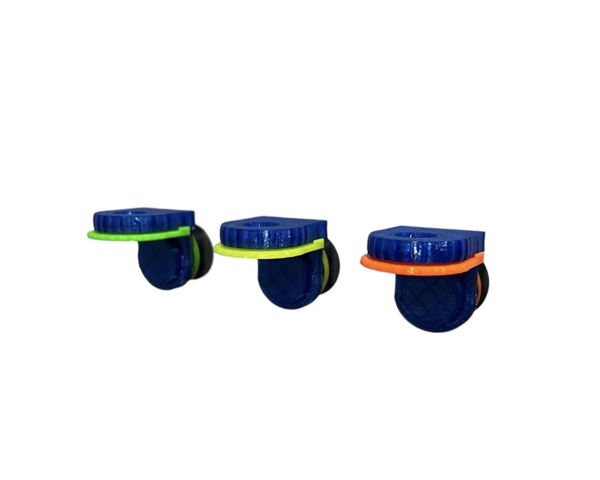 •“Classic flat single frag rack in red, orange, and green”
•“Mounted classic coral frag rack with single plug slot”
•“Top view of colorful 3-pack single plug coral mounts”