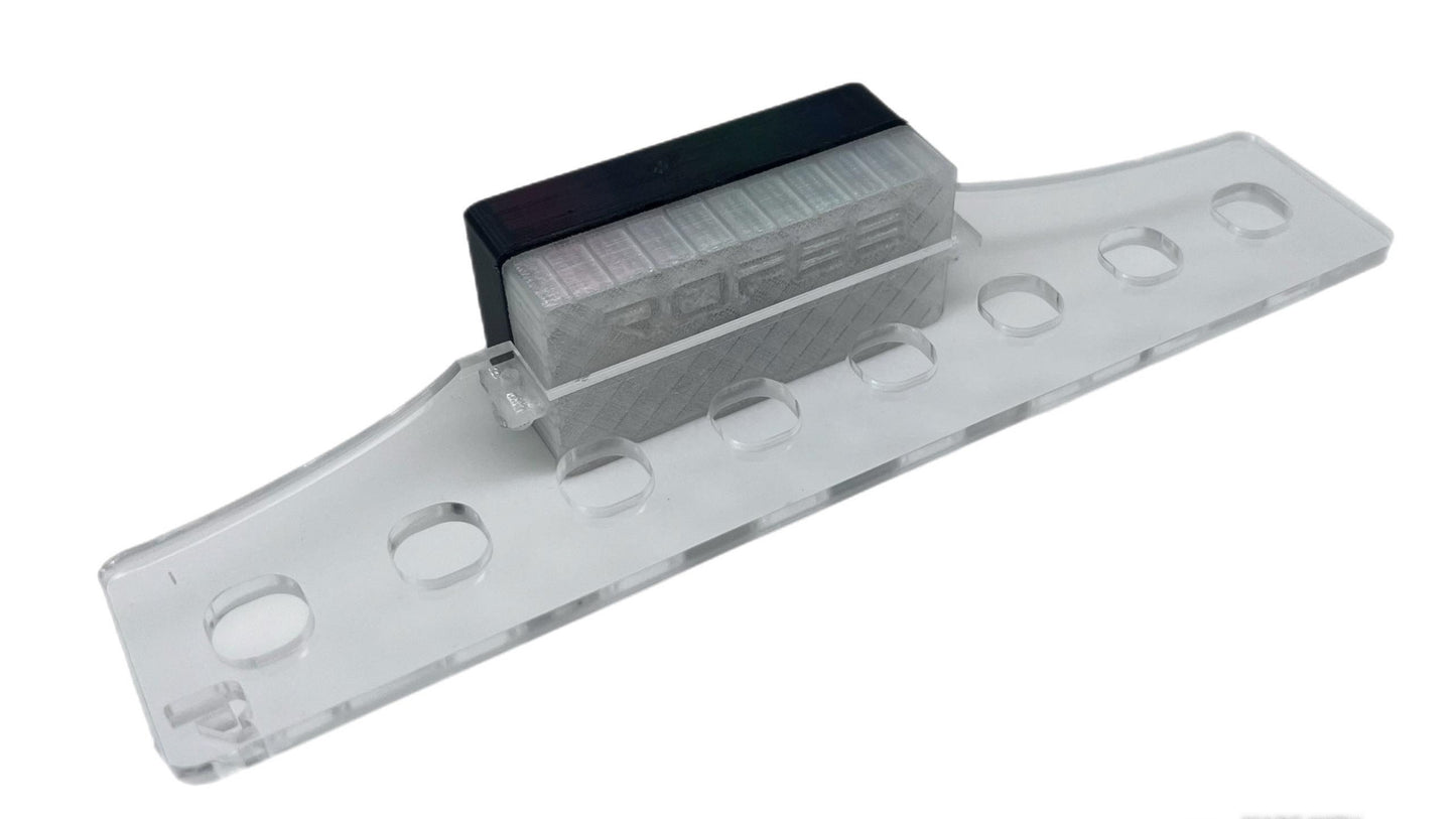 •“Top view of 8 plug coral frag rack with acrylic base”
•“Side view showing 3D printed inserts and acetate locks”
•“Mounted frag rack on aquarium glass”