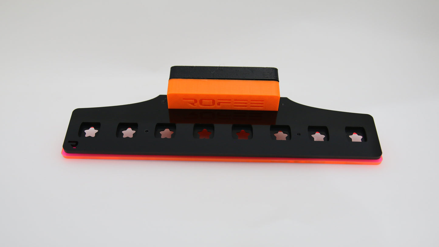 •“Top view of 8 plug coral frag rack with acrylic base”
•“Side view showing 3D printed inserts and acetate locks”
•“Mounted frag rack on aquarium glass”
