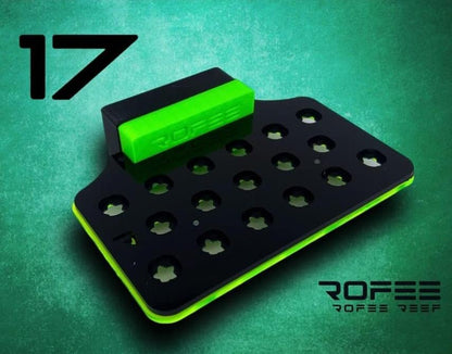 •“Top view of 17 plug coral frag rack with acrylic base”
•“Side view showing 3D printed inserts and acetate locks”
•“Mounted frag rack on glass with magnetic hold”
