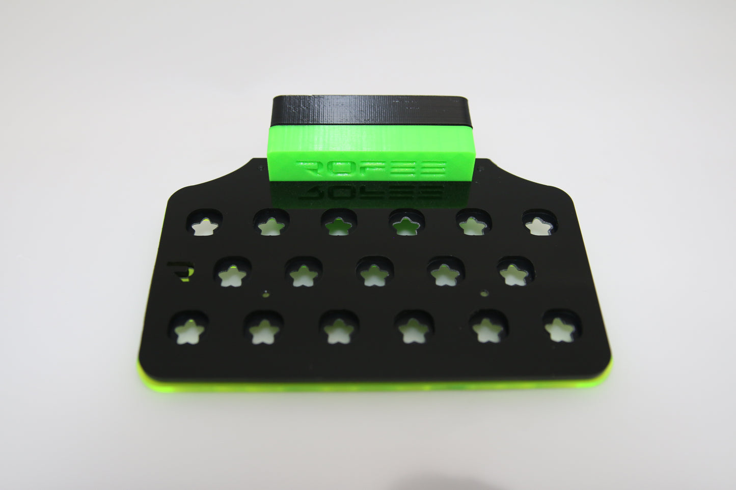 •“Top view of 17 plug coral frag rack with acrylic base”
•“Side view showing 3D printed inserts and acetate locks”
•“Mounted frag rack on glass with magnetic hold”