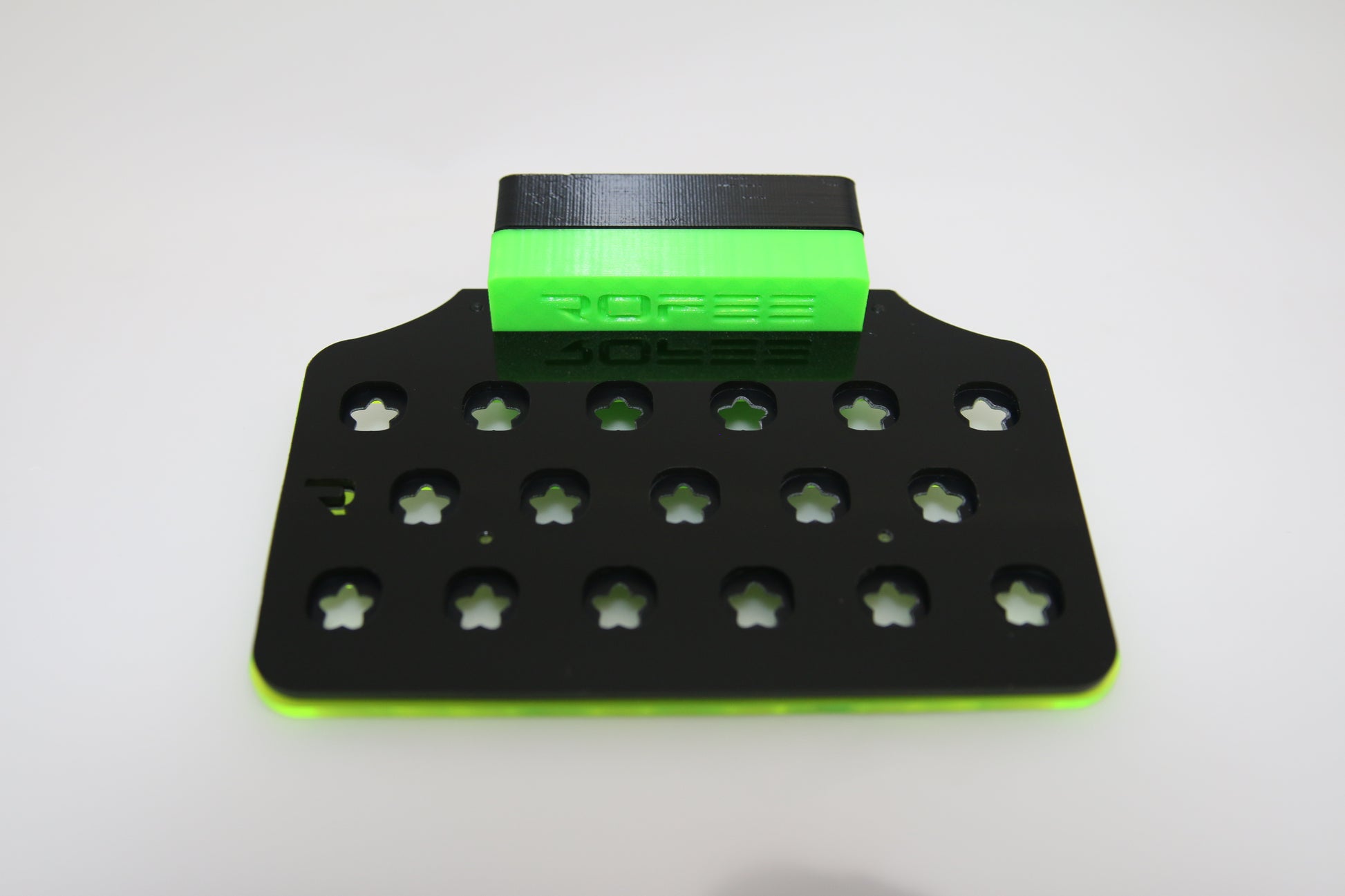 •“Top view of 17 plug coral frag rack with acrylic base”
•“Side view showing 3D printed inserts and acetate locks”
•“Mounted frag rack on glass with magnetic hold”