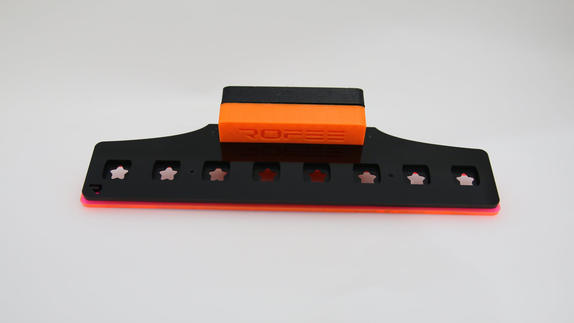 •“Top view of 8 plug coral frag rack with acrylic base”
•“Side view showing 3D printed inserts and acetate locks”
•“Mounted frag rack on aquarium glass”
